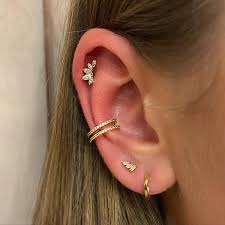 What is a mid helix piercing pain What is a mid helix piercing jewelry What is a mid helix piercing healing What is a mid helix piercing healing process Forward helix piercing Lower helix piercing Helix piercing Jewelry Helix piercing healing time